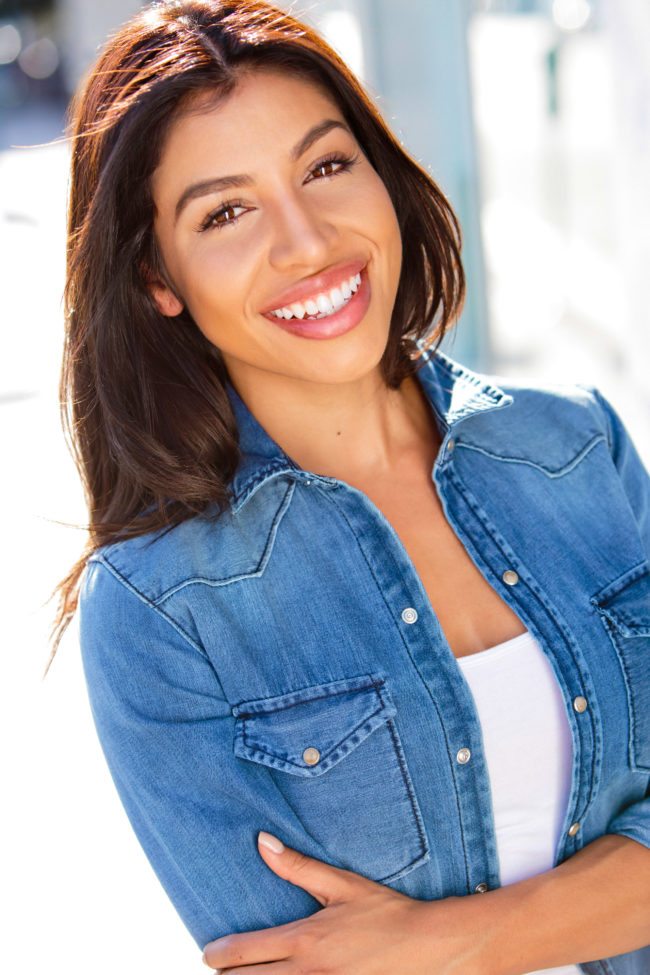 Smiling Evelyn Gonzalez photographed by Michael Roud Photography in Los Angeles