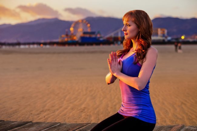Headshot of Yoga at the Beach with Ferris Wheel in Distance