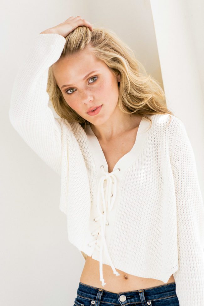 Maddie Reed in white sweater photographed by Michael Roud Photography in Los Angeles