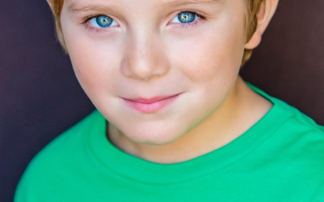 Boy in Green a Kids Headshot by Michael Roud Photography