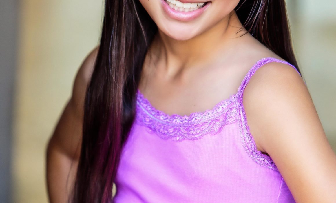 Smiling Teen Actress Headshot by Michael Roud in LA